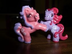 Playing with horse toys