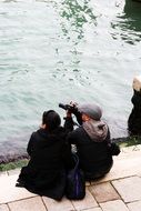 photographers near the water