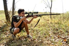 young man with weapon
