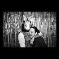 photo of a girl and a man in a rabbit mask