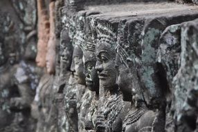 persons in the temple complex in cambodia