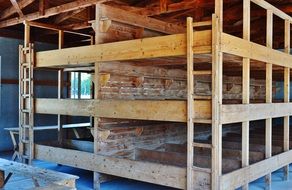 beds in three floors in a concentration camp