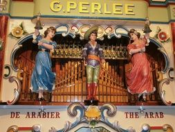 g.perlee street organ with artists figures