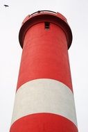 red and white lighthouse bottom view