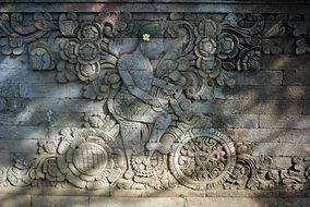 bas-relief on the wall of the temple in bali