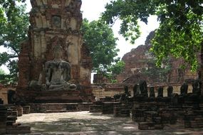 Buddha statue among the ruins in Ayutthaya city