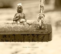 buddha figurine on a swing