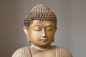 Wooden statue of buddha is sign of balance