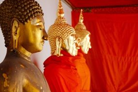 golden buddhas in bangkok temple