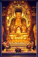 golden buddha statue in Pekin