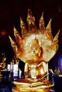 golden buddha in a buddhist temple in bangkok