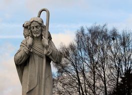 statue of jesus with a staff