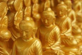 gold figures of Buddha