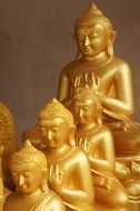 gilded buddha figures