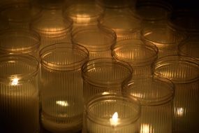 burning candles in jars