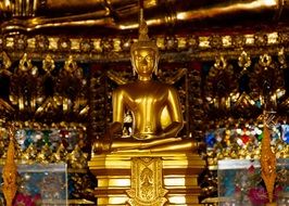 golden statue in buddhism