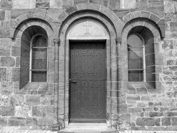 entrance door to the church, black and white