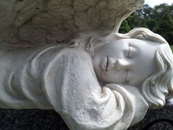 closeup picture of white Angel Statue