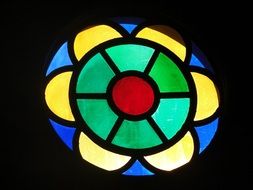 multicolored stained glass window in a catholic church
