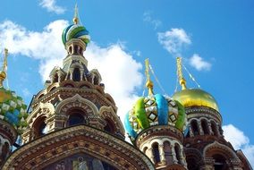 Cathedral with colorful domes in St. Petersburg under the bright sun
