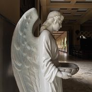 white Angel with bowl, Sculpture in Church