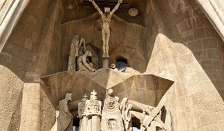 historic stone figures on the facade of sagrada familia in barcelona