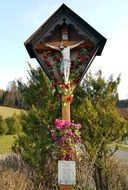 cross with jesus near the chapel, stryszawa, poland