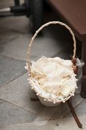 wicker basket with white flowers