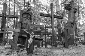 black and white photo of crosses for worship