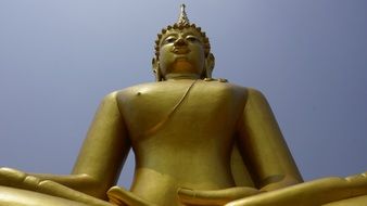 Golden Buddha statue sitting