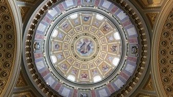 beautiful stained glass window on the ceiling in the church of St. Stephen
