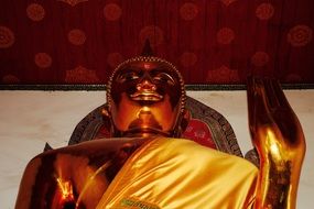 huge buddha in a buddhist palace in bangkok