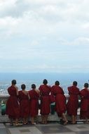 monks near a temple in thailand