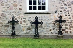 three crosses near the chapel in the cemetery