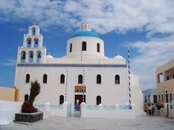 white church with a bell tower on the island of Mykonos