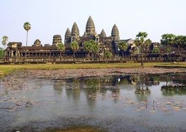 remote view of the ruins of a temple complex in cambodia