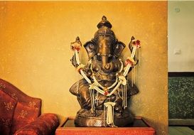 golden ganesha statue in the room