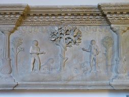 relief of Adam and Eve on the wall