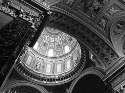 Black and white photo of a dome in a European church