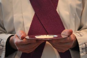 Holy Communion in hands of Priest, sweden, järfälla