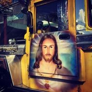 painting of Jesus on the bus door