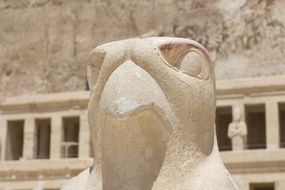 statue among the ruins in the city of Luxor