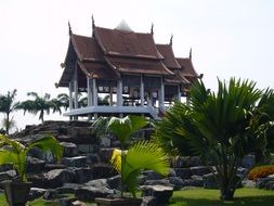 green trees near temple complex in thailand