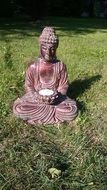 figure of mediating buddha in the garden