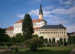 Weesenstein Castle in park at summer, germany