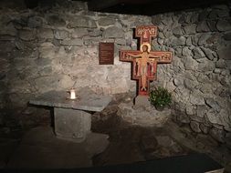 stone room and crucifixion