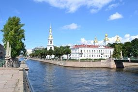 Distant view of St. Nicholas Cathedral near the water channel in St. Petersburg