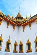 white facade of the Temple of the Emerald Buddha