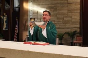 priest on the altar in the cathedral