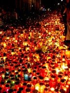 The lots of lighting candles in Krakow